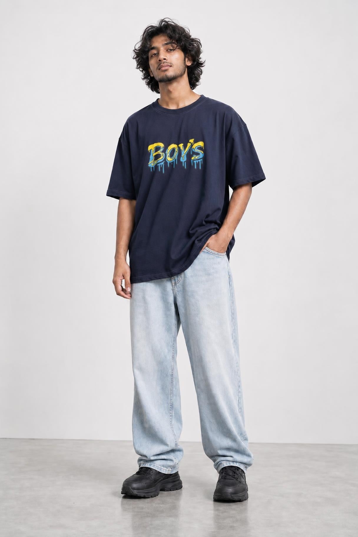 Boys graffiti oversized tee in navy, front view on him