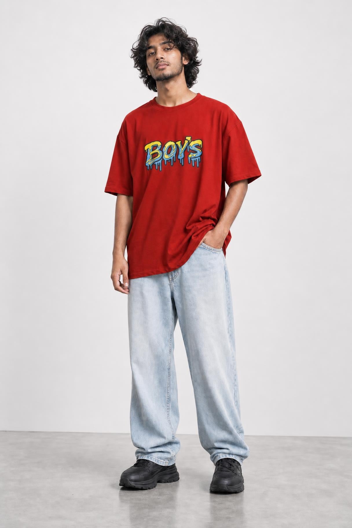 Boys graffiti oversized tee in red, front view on him