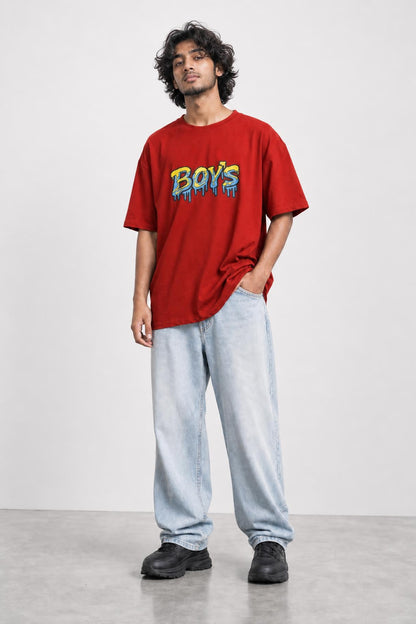 Boys graffiti oversized tee in red, front view on him