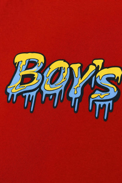 Close view of the dripping graffiti print on red cotton