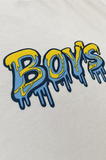 Close view of the dripping graffiti print on white cotton