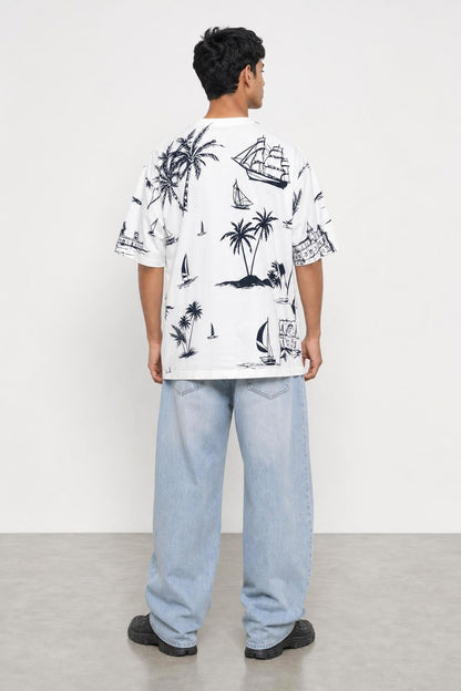 Goa tropical oversized tee in white, back view on him