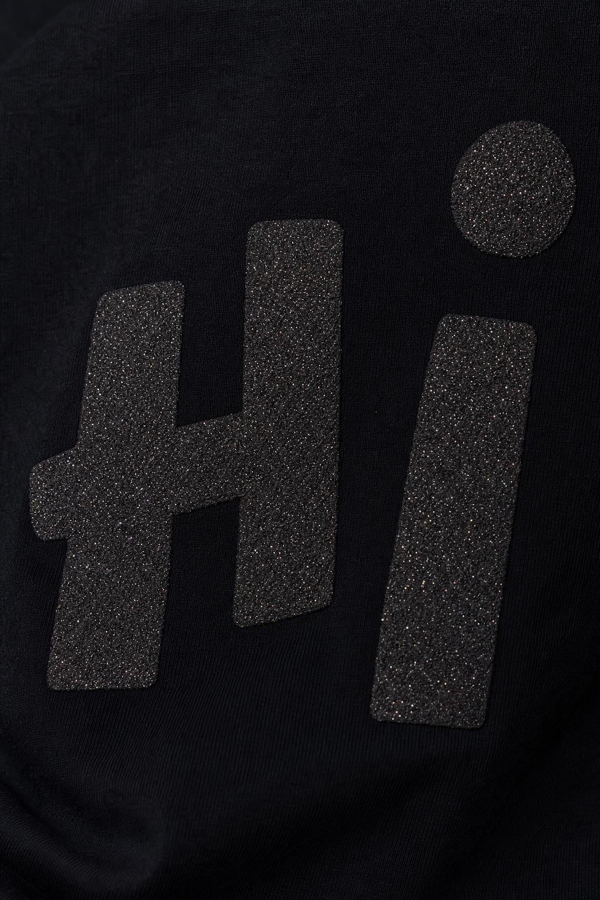 Close view of the Hi glitter print on black cotton