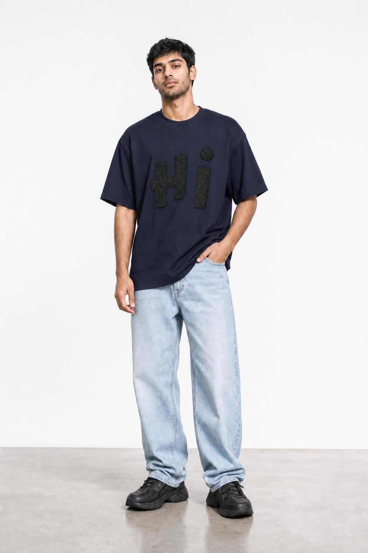 Hi glitter oversized tee in navy, front view on him