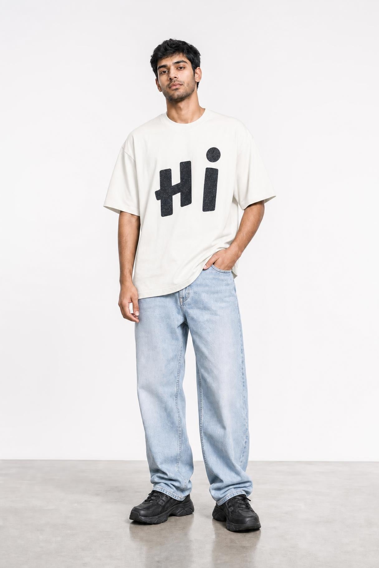 Hi glitter oversized tee in white, front view on him