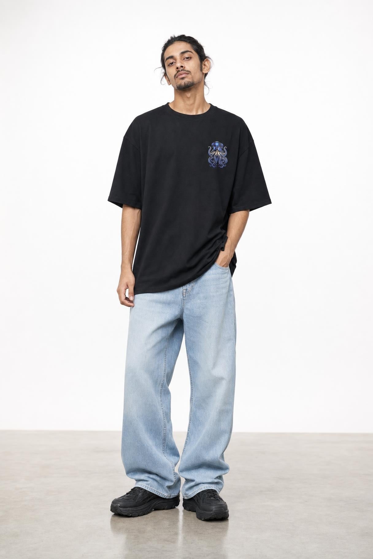 Octopus DJ oversized tee in black, front view on him