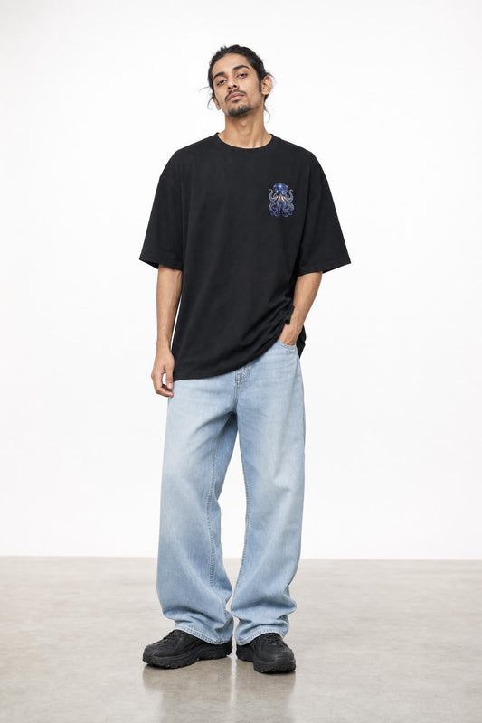 Octopus DJ oversized tee in black, front view on him