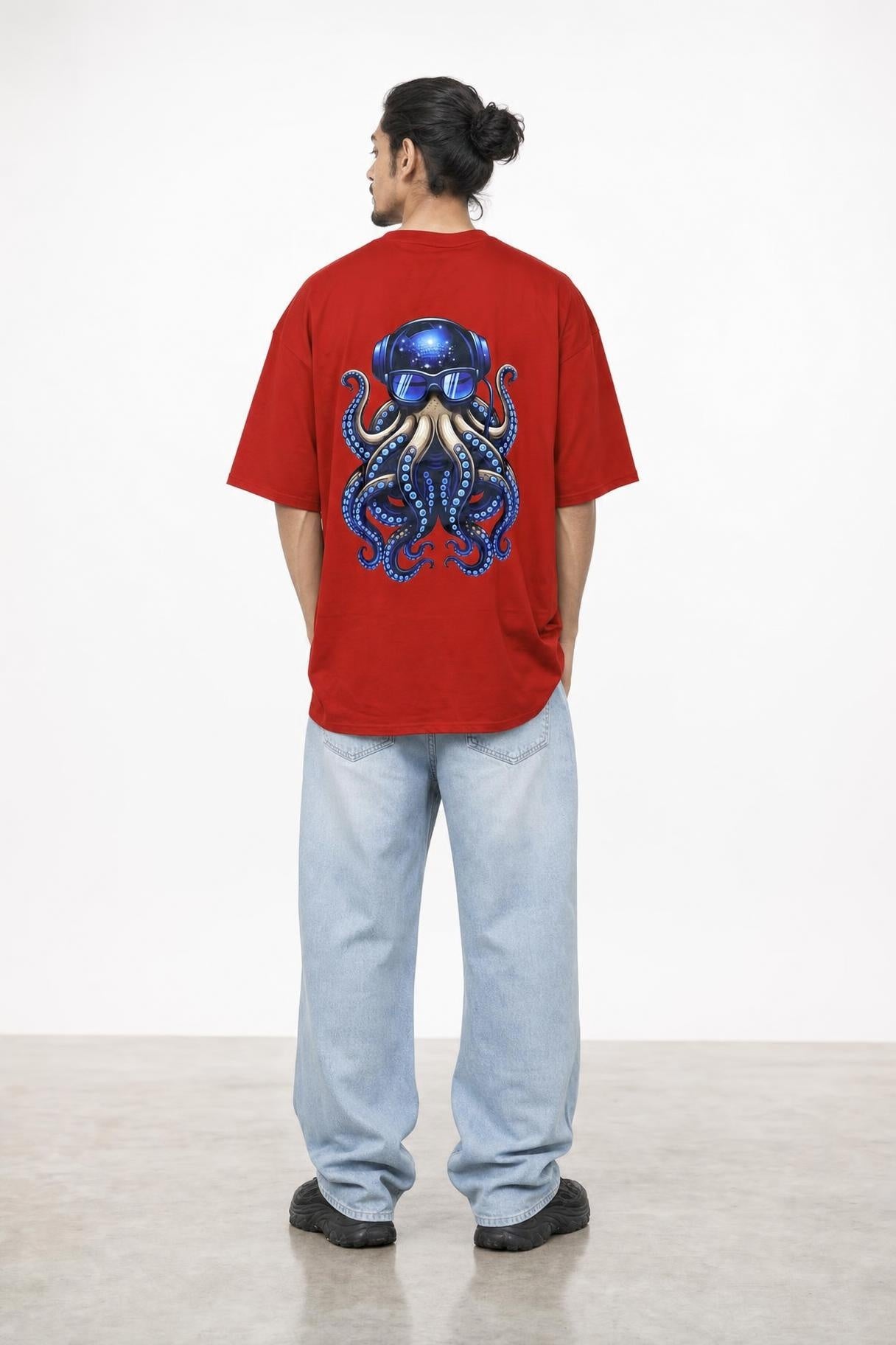Octopus DJ oversized tee in red, back print view on him