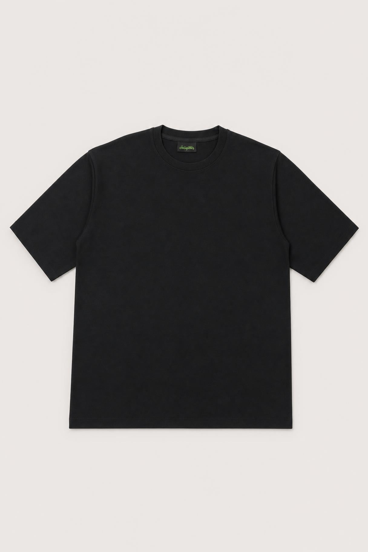 Plain oversized tee in black, flat lay