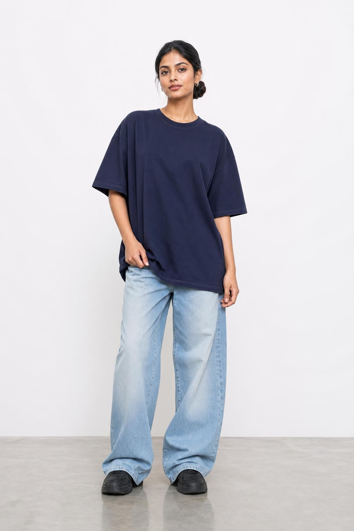 Plain oversized tee in navy, front view on her