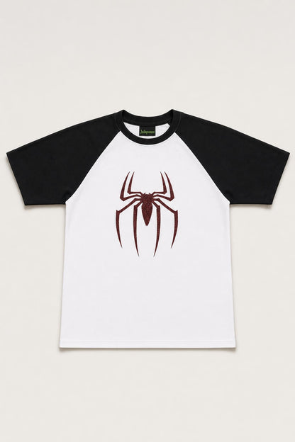 Spider glitter raglan tee with black sleeves, flat lay