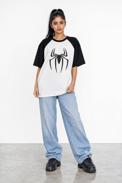 Spider glitter raglan tee with black sleeves, front view on her