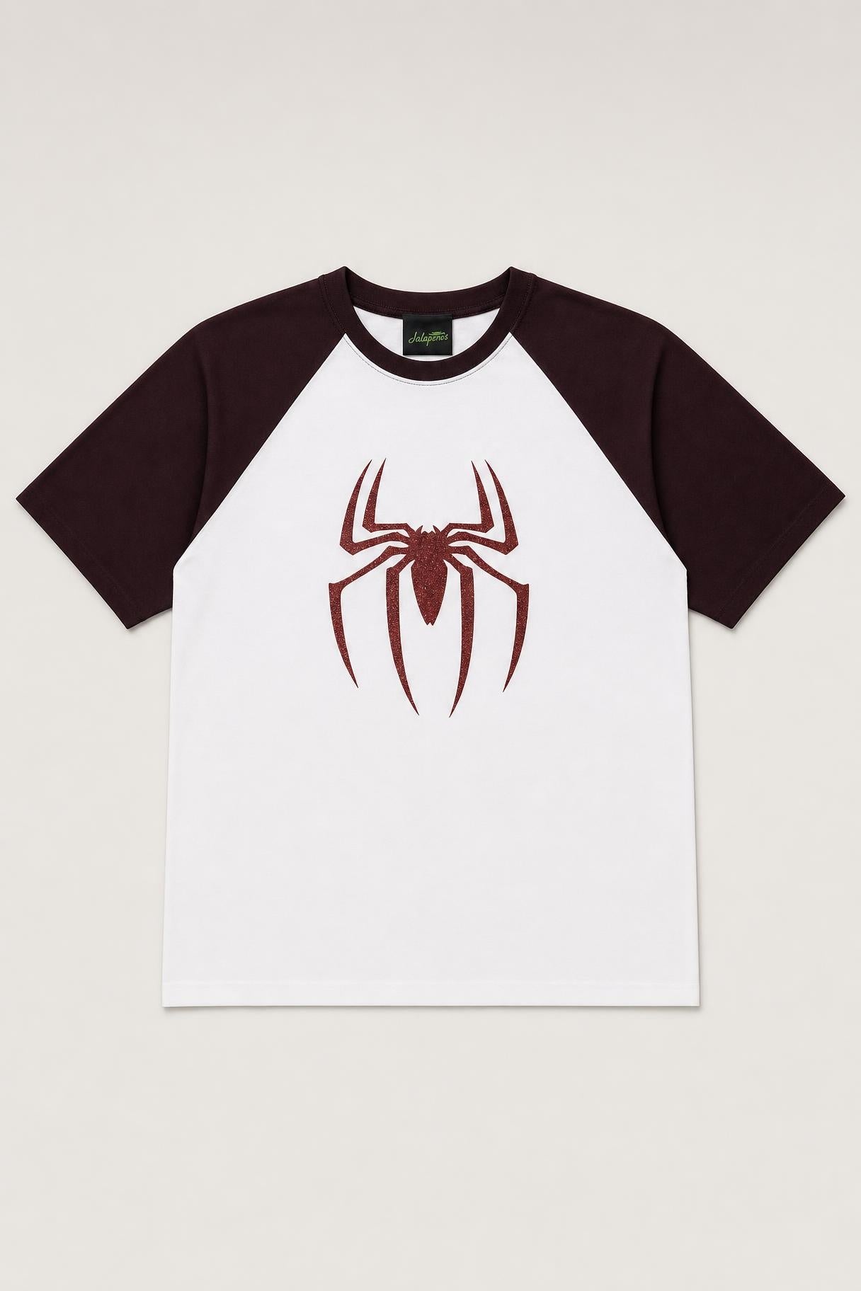 Spider glitter raglan tee with maroon sleeves, flat lay